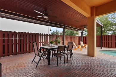 Stunning corner-lot home built in 2012, featuring modern design on Fontainebleau Golf Course in Florida - for sale on GolfHomes.com, golf home, golf lot