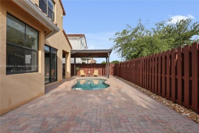 Stunning corner-lot home built in 2012, featuring modern design on Fontainebleau Golf Course in Florida - for sale on GolfHomes.com, golf home, golf lot