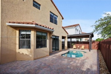 Stunning corner-lot home built in 2012, featuring modern design on Fontainebleau Golf Course in Florida - for sale on GolfHomes.com, golf home, golf lot