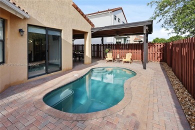 Stunning corner-lot home built in 2012, featuring modern design on Fontainebleau Golf Course in Florida - for sale on GolfHomes.com, golf home, golf lot
