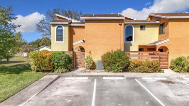 This beautifully renovated 2-bedroom, 2.5-bathroom townhouse on Woodmont Country Club in Florida - for sale on GolfHomes.com, golf home, golf lot