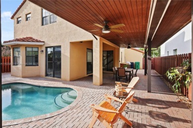 Stunning corner-lot home built in 2012, featuring modern design on Fontainebleau Golf Course in Florida - for sale on GolfHomes.com, golf home, golf lot
