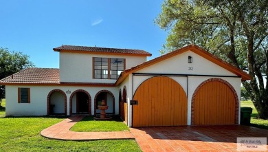 Welcome to this beautifully updated 4-bedroom, 4-bath home in on Rancho Viejo Resort and Country Club in Texas - for sale on GolfHomes.com, golf home, golf lot