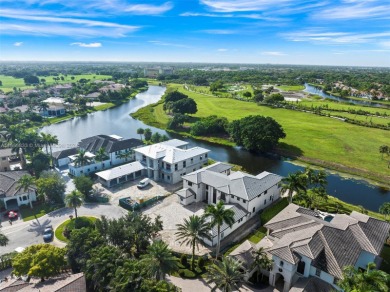 Welcome to your dream home in the exclusive Heron Estates. This on Heron Bay Golf Club in Florida - for sale on GolfHomes.com, golf home, golf lot