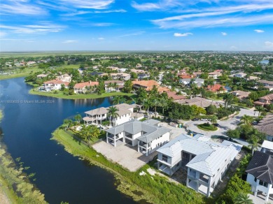 Welcome to your dream home in the exclusive Heron Estates. This on Heron Bay Golf Club in Florida - for sale on GolfHomes.com, golf home, golf lot