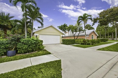 Enjoy South Florida living from this lovely Divosta-built home! on Bear Lakes Country Club in Florida - for sale on GolfHomes.com, golf home, golf lot