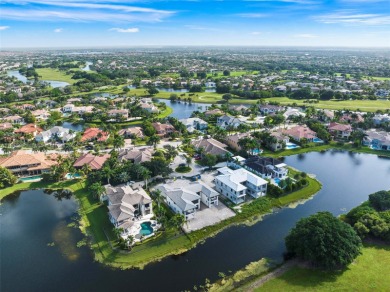 Welcome to your dream home in the exclusive Heron Estates. This on Heron Bay Golf Club in Florida - for sale on GolfHomes.com, golf home, golf lot