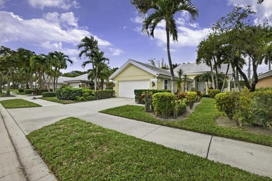 Enjoy South Florida living from this lovely Divosta-built home! on Bear Lakes Country Club in Florida - for sale on GolfHomes.com, golf home, golf lot