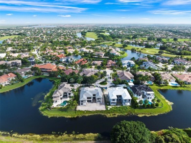 Welcome to your dream home in the exclusive Heron Estates. This on Heron Bay Golf Club in Florida - for sale on GolfHomes.com, golf home, golf lot