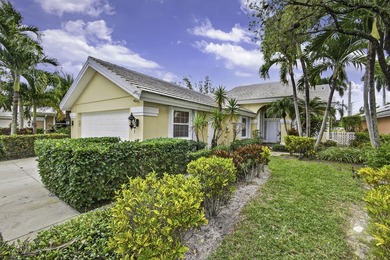 Enjoy South Florida living from this lovely Divosta-built home! on Bear Lakes Country Club in Florida - for sale on GolfHomes.com, golf home, golf lot