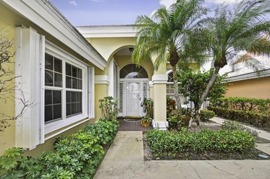 Enjoy South Florida living from this lovely Divosta-built home! on Bear Lakes Country Club in Florida - for sale on GolfHomes.com, golf home, golf lot