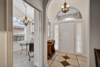 Enjoy South Florida living from this lovely Divosta-built home! on Bear Lakes Country Club in Florida - for sale on GolfHomes.com, golf home, golf lot