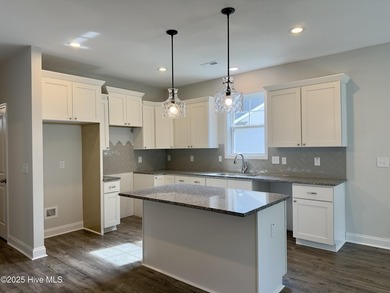 Welcome to your dream home! This stunning 2,352 square foot on Woodlake Country Club in North Carolina - for sale on GolfHomes.com, golf home, golf lot