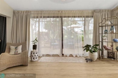 Step into effortless living in the light and bright beautifully on Deer Creek Golf Club in Florida - for sale on GolfHomes.com, golf home, golf lot