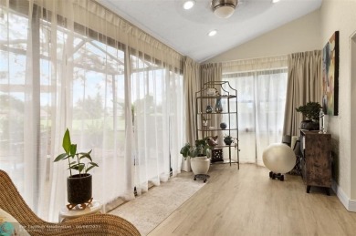Step into effortless living in the light and bright beautifully on Deer Creek Golf Club in Florida - for sale on GolfHomes.com, golf home, golf lot
