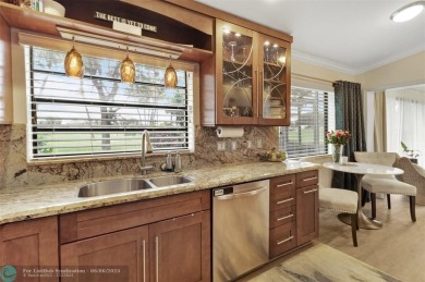 Step into effortless living in the light and bright beautifully on Deer Creek Golf Club in Florida - for sale on GolfHomes.com, golf home, golf lot