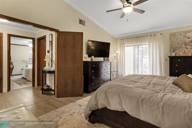Step into effortless living in the light and bright beautifully on Deer Creek Golf Club in Florida - for sale on GolfHomes.com, golf home, golf lot