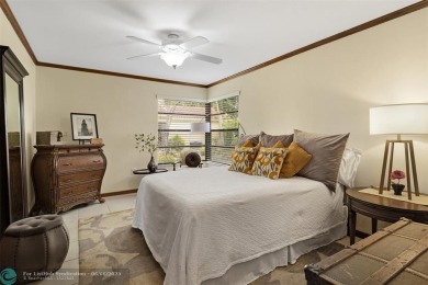 Step into effortless living in the light and bright beautifully on Deer Creek Golf Club in Florida - for sale on GolfHomes.com, golf home, golf lot
