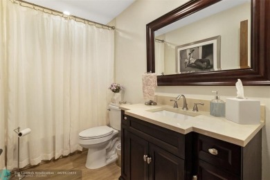 Step into effortless living in the light and bright beautifully on Deer Creek Golf Club in Florida - for sale on GolfHomes.com, golf home, golf lot