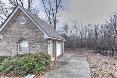 Welcome to this engaging 3-bedroom, 2-bathroom home in the on Wildflower Country Club in Texas - for sale on GolfHomes.com, golf home, golf lot