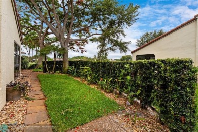 Step into effortless living in the light and bright beautifully on Deer Creek Golf Club in Florida - for sale on GolfHomes.com, golf home, golf lot