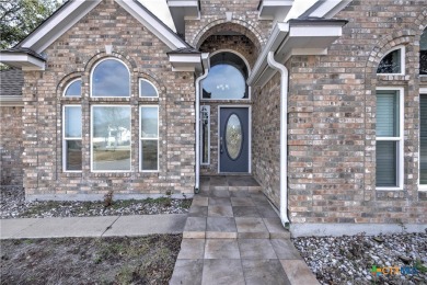 Welcome to this engaging 3-bedroom, 2-bathroom home in the on Wildflower Country Club in Texas - for sale on GolfHomes.com, golf home, golf lot