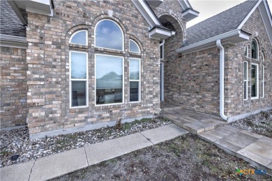 Welcome to this engaging 3-bedroom, 2-bathroom home in the on Wildflower Country Club in Texas - for sale on GolfHomes.com, golf home, golf lot