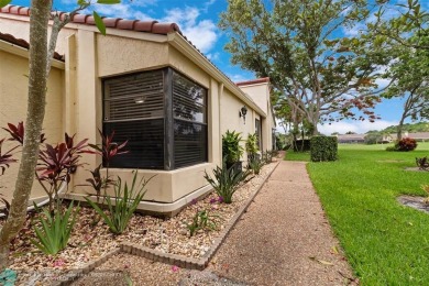 Step into effortless living in the light and bright beautifully on Deer Creek Golf Club in Florida - for sale on GolfHomes.com, golf home, golf lot