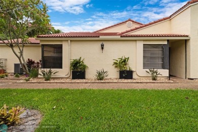 Step into effortless living in the light and bright beautifully on Deer Creek Golf Club in Florida - for sale on GolfHomes.com, golf home, golf lot