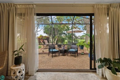 Step into effortless living in the light and bright beautifully on Deer Creek Golf Club in Florida - for sale on GolfHomes.com, golf home, golf lot