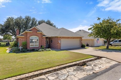 Gorgeous - fantastic drive up appeal and outstanding golf lot on Pecan Plantation Country Club in Texas - for sale on GolfHomes.com, golf home, golf lot
