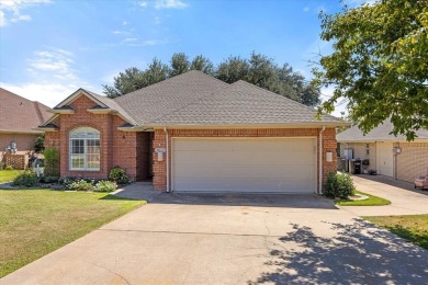 Gorgeous - fantastic drive up appeal and outstanding golf lot on Pecan Plantation Country Club in Texas - for sale on GolfHomes.com, golf home, golf lot