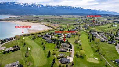 Enjoy mountain and peek-a-boo lake views from this .22 acre golf on Polson Bay Golf Course - Championship Course in Montana - for sale on GolfHomes.com, golf home, golf lot