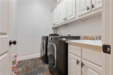 Welcome to 2230 Cambridge Hill Court, an elegant 3-story home on Hamilton Mill Golf Club in Georgia - for sale on GolfHomes.com, golf home, golf lot