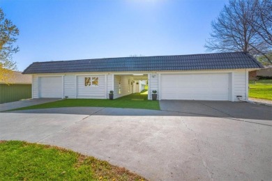 This gorgeous California Split Level home, designed and lived in on Lawrence Country Club in Kansas - for sale on GolfHomes.com, golf home, golf lot