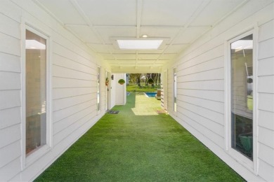 This gorgeous California Split Level home, designed and lived in on Lawrence Country Club in Kansas - for sale on GolfHomes.com, golf home, golf lot