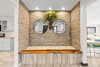 This gorgeous California Split Level home, designed and lived in on Lawrence Country Club in Kansas - for sale on GolfHomes.com, golf home, golf lot