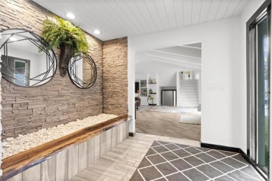 This gorgeous California Split Level home, designed and lived in on Lawrence Country Club in Kansas - for sale on GolfHomes.com, golf home, golf lot