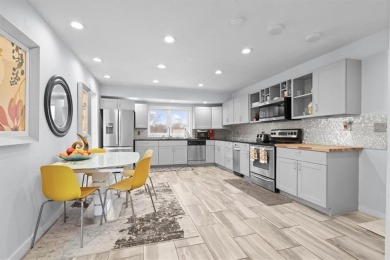 This gorgeous California Split Level home, designed and lived in on Lawrence Country Club in Kansas - for sale on GolfHomes.com, golf home, golf lot