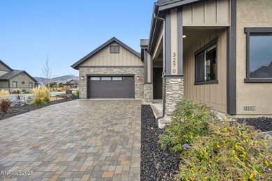 Built in 2023, this 4-bedroom, 3-bath, 2,448 sq ft luxury home on Silver Oak Golf Course in Nevada - for sale on GolfHomes.com, golf home, golf lot