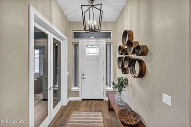 Built in 2023, this 4-bedroom, 3-bath, 2,448 sq ft luxury home on Silver Oak Golf Course in Nevada - for sale on GolfHomes.com, golf home, golf lot