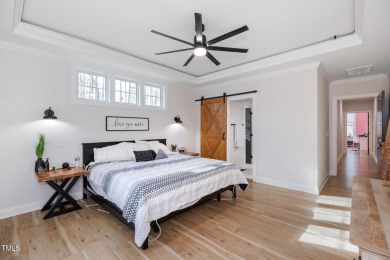 Welcome to this stunning and charming farmhouse-style, perfectly on River Golf and County Club at Lake Royale in North Carolina - for sale on GolfHomes.com, golf home, golf lot