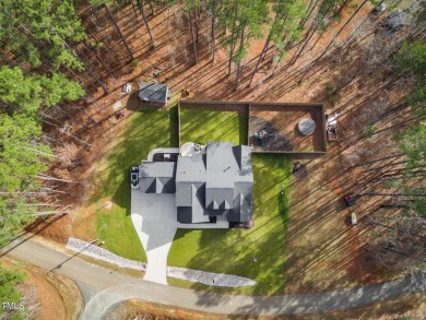 Welcome to this stunning and charming farmhouse-style, perfectly on River Golf and County Club at Lake Royale in North Carolina - for sale on GolfHomes.com, golf home, golf lot