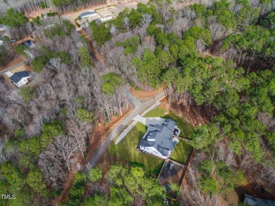 Welcome to this stunning and charming farmhouse-style, perfectly on River Golf and County Club at Lake Royale in North Carolina - for sale on GolfHomes.com, golf home, golf lot