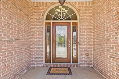 Welcome to luxury living in the prestigious gated Crystal Lake on Crystal Lake Golf and Country Club in Georgia - for sale on GolfHomes.com, golf home, golf lot