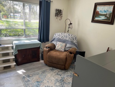 GROUND FLOOR CONDO located on the 8th Fairway of the Heather on Heather Golf and Country Club in Florida - for sale on GolfHomes.com, golf home, golf lot