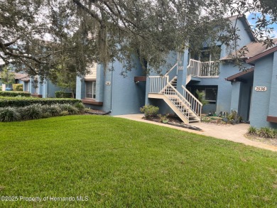 GROUND FLOOR CONDO located on the 8th Fairway of the Heather on Heather Golf and Country Club in Florida - for sale on GolfHomes.com, golf home, golf lot