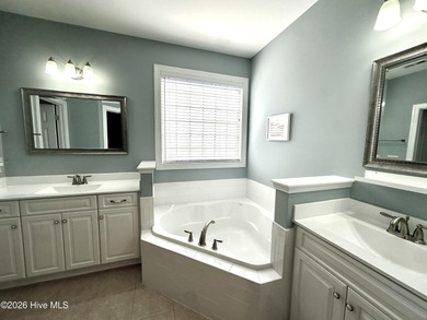 This all-brick, well-maintained, ranch home is located just on Magnolia Greens Golf Plantation in North Carolina - for sale on GolfHomes.com, golf home, golf lot