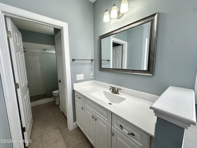 This all-brick, well-maintained, ranch home is located just on Magnolia Greens Golf Plantation in North Carolina - for sale on GolfHomes.com, golf home, golf lot