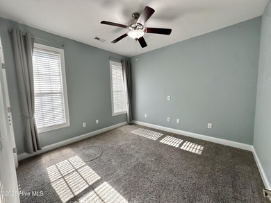 This all-brick, well-maintained, ranch home is located just on Magnolia Greens Golf Plantation in North Carolina - for sale on GolfHomes.com, golf home, golf lot